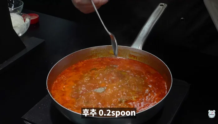 Add chopped needle mushrooms.
