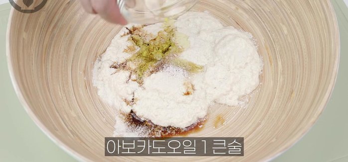 In a bowl, mix the mashed tofu with soy sauce, salt, avocado oil, sesame oil, shiitake mushroom powder, and perilla seed powder.