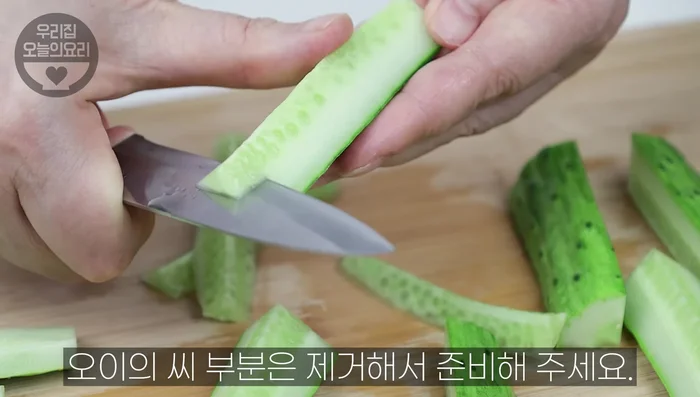Remove the cucumber seeds.