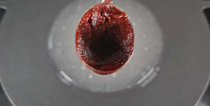 Add two spoons of gochujang and one spoon of brewing soy sauce.