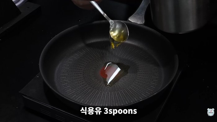 Add pork to a pan and cook it in the oven.