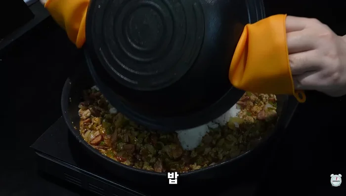 Fry the cooked rice until fluffy.