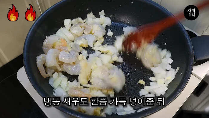 Add frozen shrimp and stir-fry until golden brown.