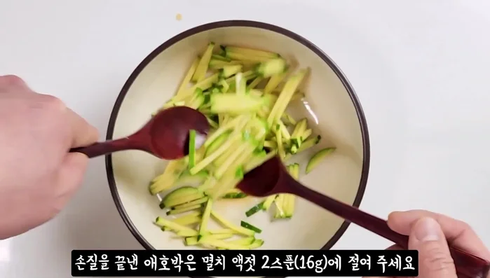 Marinate zucchini in 2 spoons of anchovy sauce to prevent breaking and add flavor.