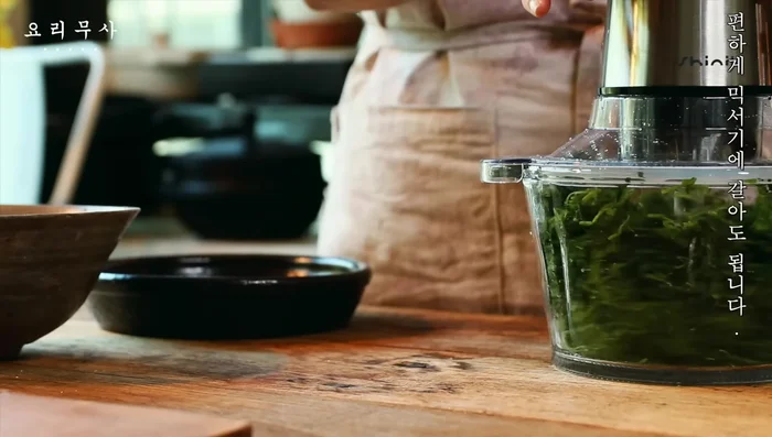 Grind beans into powder using a mortar and pestle or blender.