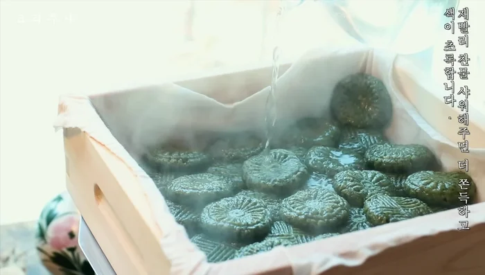 After steaming, quickly cool the rice cakes with cold water for a stickier, greener result.