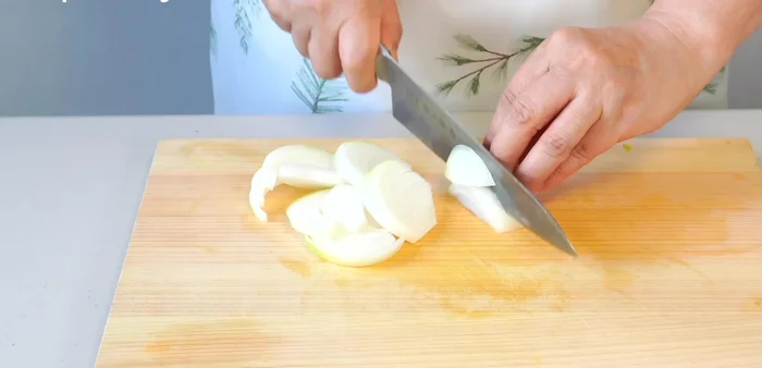 Slice onions and green peppers.