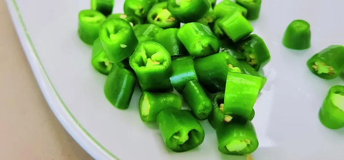 Soak the chili pepper seeds in water to remove some of the spiciness (optional).