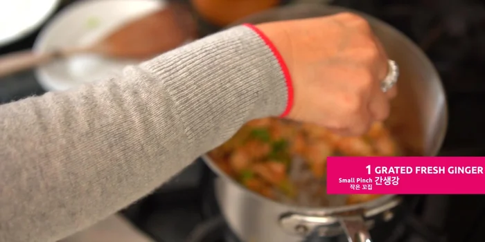 Add a small amount of fresh ginger. Saute for less than 30 seconds.