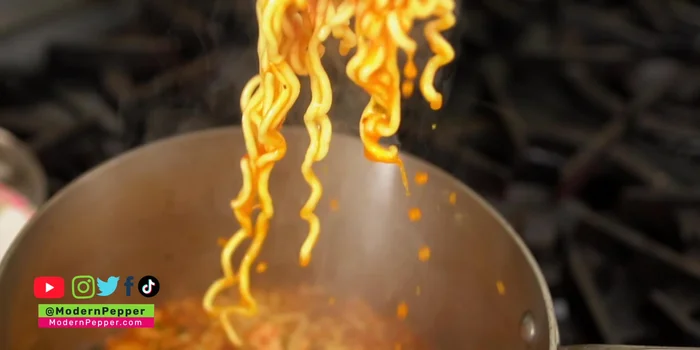 Transfer the ramen to a serving bowl.