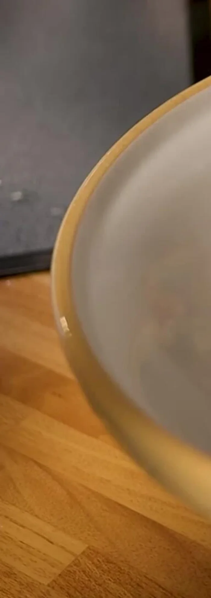 Gently warm the sauce with a tiny bit of water to thin it slightly.