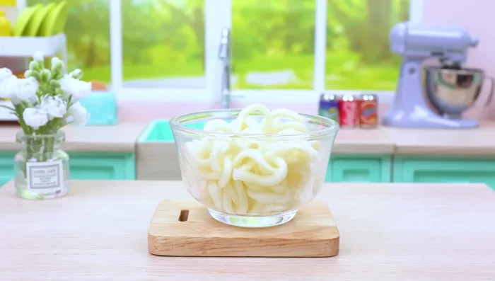 Cook the noodles.