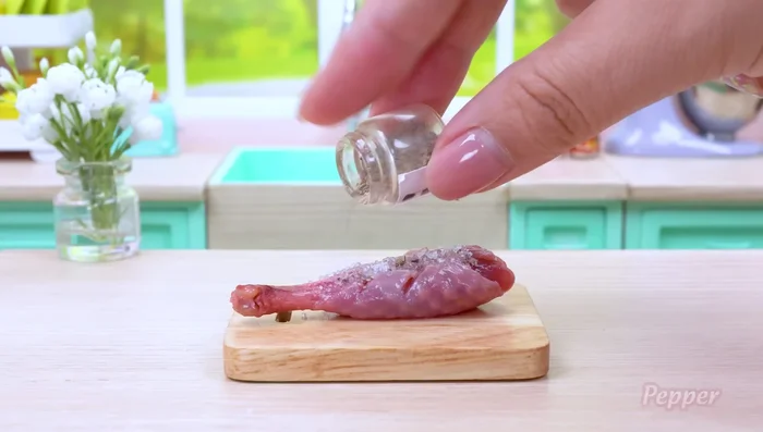 Season the chicken thigh with salt and pepper.