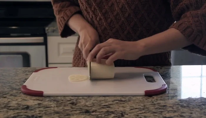 Obtain peeled fresh lotus root and slice it into 32 thin slices (about 1/8 inch thick).