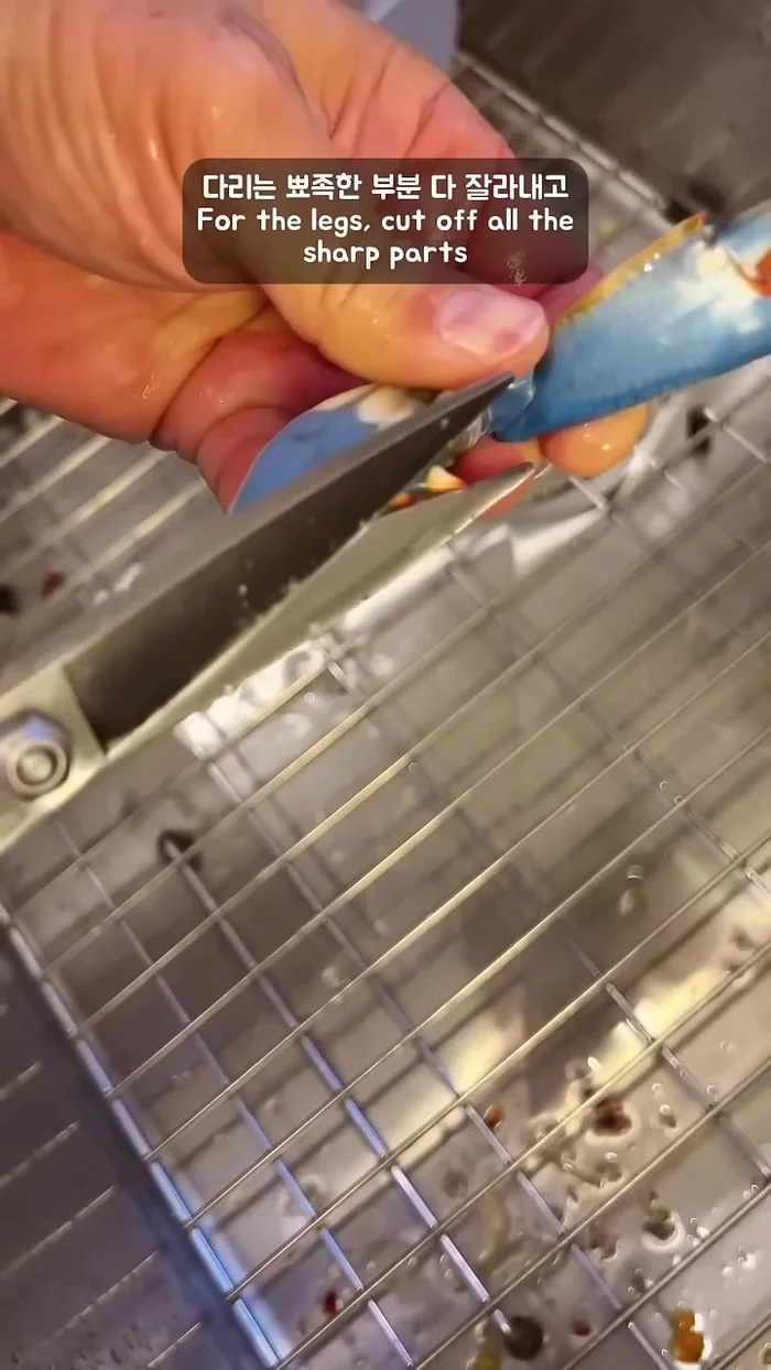Trim the legs by cutting off sharp parts and cutting them in half for easy eating.