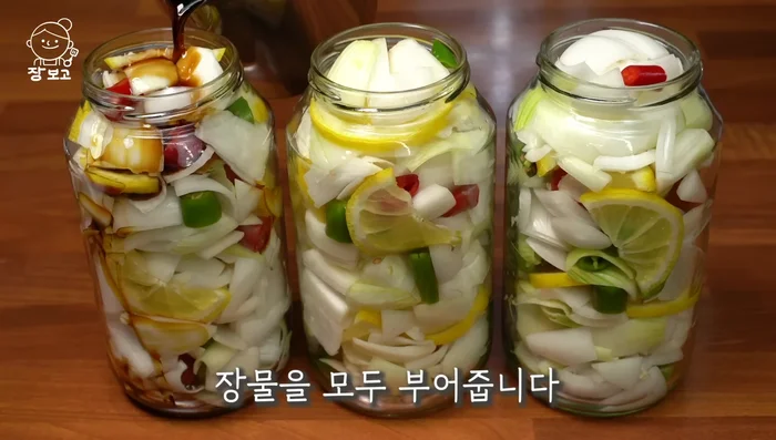 Pour the sauce mixture over the onions and peppers in the bowl.