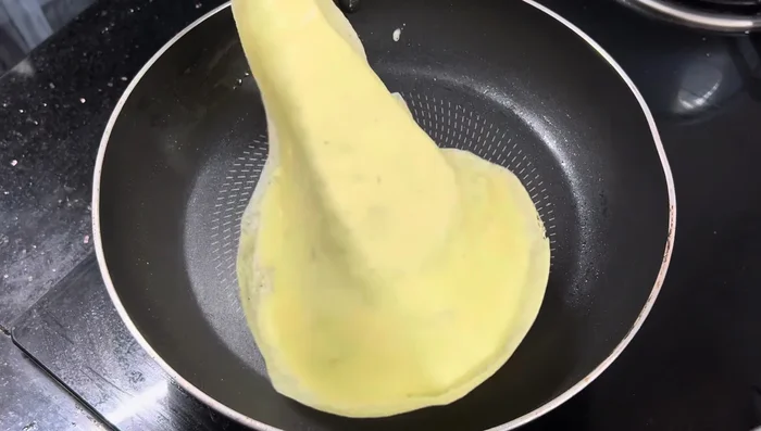 Transfer the pancake to a plate. Repeat with the remaining batter.