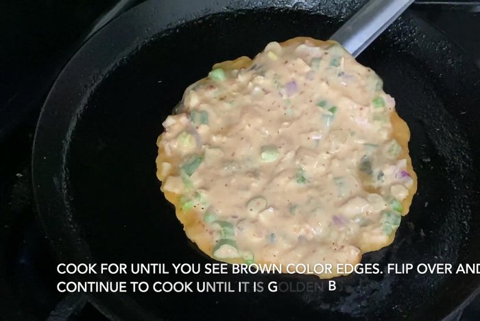 Cook for a few minutes until the bottom is golden brown and crispy.