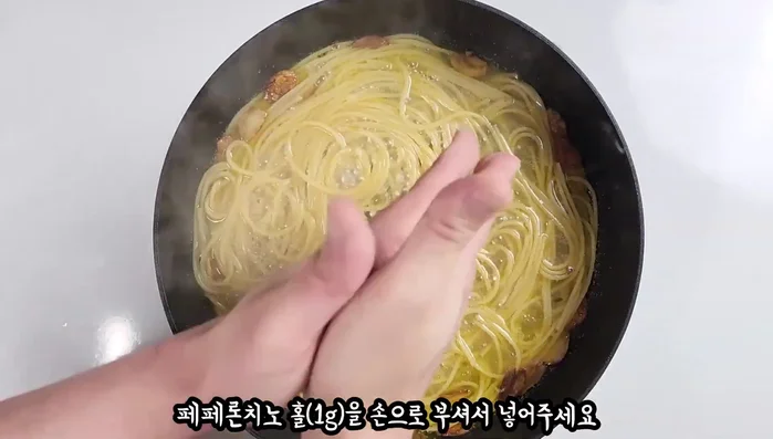 Boil for 10-11 minutes, stirring occasionally. Crumble peperoncino (or Cheongyang pepper) and add.