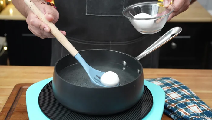 Soft boil eggs for 6 1/2 minutes, then shock in ice bath. Peel gently.