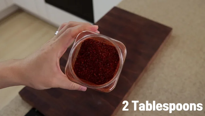 Make the seasoning paste: Combine gochujang, gochugaru, soy sauce, oyster sauce, chicken bouillon powder, sugar, honey, and black pepper in a small container. Mix well.