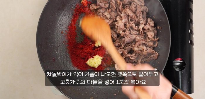 Simmer the broth: Reduce heat and let it simmer until flavors meld. [Inferred]