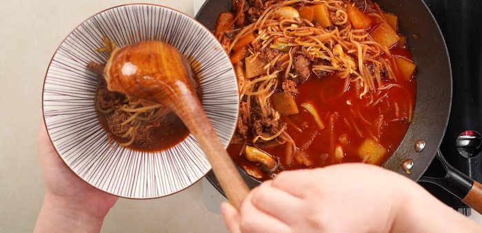 Add noodles: Add your preferred noodles (e.g., ramen, udon) and cook according to package directions. [Inferred]