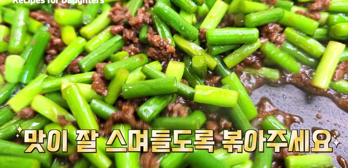Reduce heat to medium-low and stir-fry until flavors are well blended. Stir gently to avoid breaking up the ingredients.