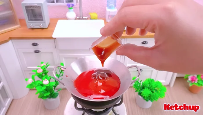 Add chili sauce and ketchup.
