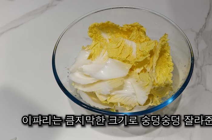 Add salt and water to submerge the cabbage; let it sit for 1-2 hours until mushy.