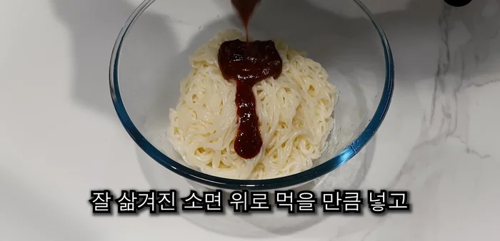 For the Radish Bibimbap Noodles: Mix gochujang, soy sauce, sugar, red pepper powder, vinegar, and sesame oil. Place on noodles, add radish kimchi and a boiled egg.
