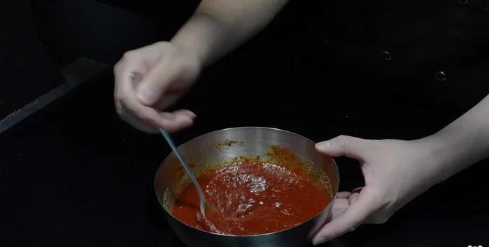Pour the seasoning mixture into the pan with the chicken and vegetables.