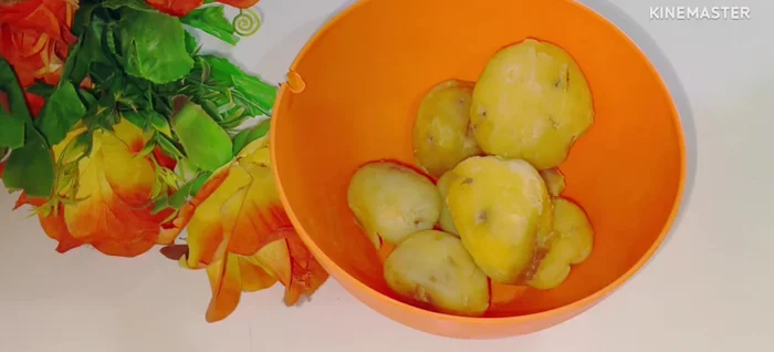 Steam potatoes until cooked. Avoid boiling them in water to retain moisture.