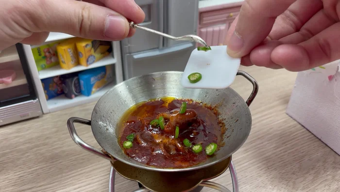Add green chilies.
