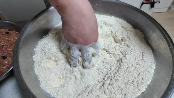 Prepare the dough: Knead all-purpose flour with water until a firm, slightly stiff dough is formed. Let the dough rest for some time, covered.