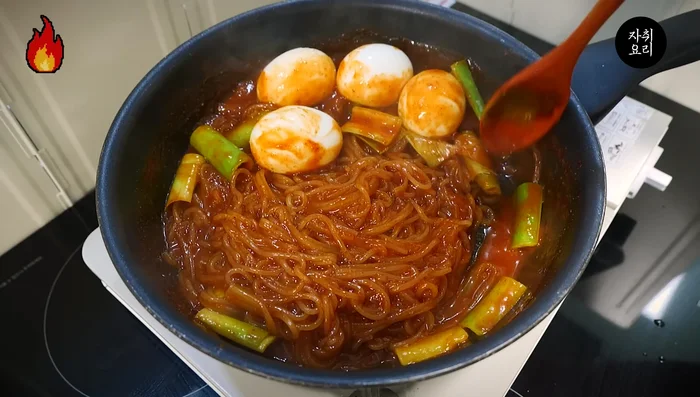 Add bite-sized pieces of boiled rice and cook for 2-3 more minutes.