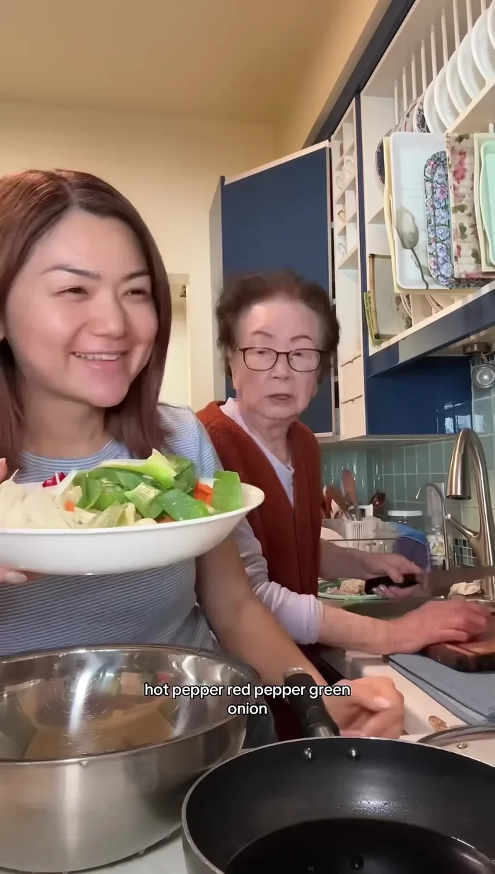Prepare the marinade ingredients: ginger, garlic, hot peppers (red and hot), and green onion. Chop them up.
