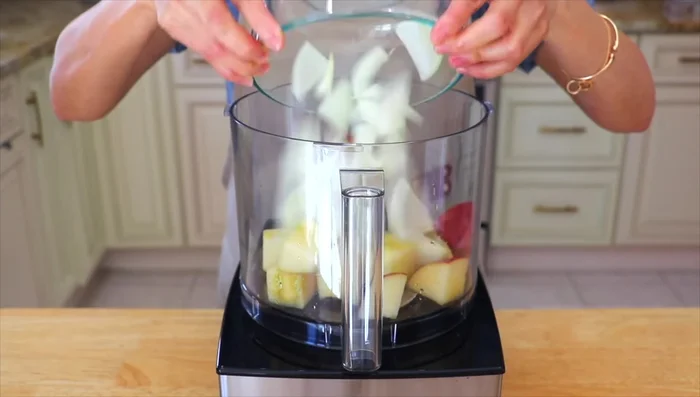 In a food processor, combine the apple/pear, onion, ginger, garlic, sugar, reserved radish liquid, and fish sauce (or soy sauce). Blend into a smooth paste.