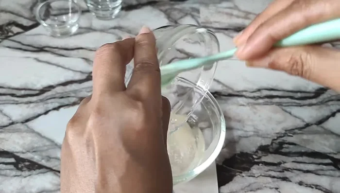 Mix in the surfactant phase (liquid surfactants). Gently mix to avoid air bubbles.
