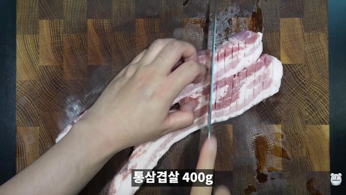 Cut the pork belly in half on both sides, then cut it into equally sized pieces.