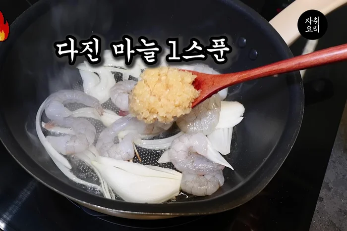For shrimp stir-fry udon: Stir-fry shrimp, garlic, and onion until browned. Add soy sauce and water.