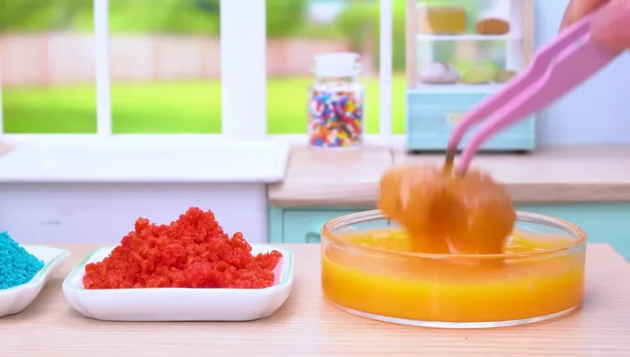 Season the chicken with crushed Cheetos and other seasonings.