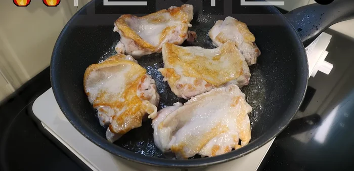 Cut the cooked chicken into bite-sized pieces.