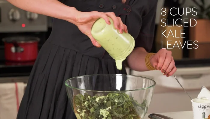 Mix the dressing into the kale.