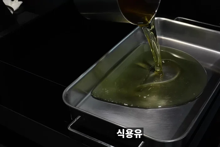 Heat oil on a high heat induction cooktop. Once hot, add the eggplants and quickly fry the outer surface until golden brown.