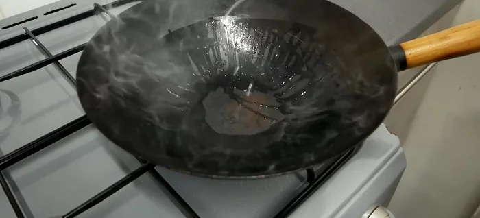 Heat oil in a pan on high heat. Add chicken and cook without stirring initially to form a seal, then stir-fry until browned.