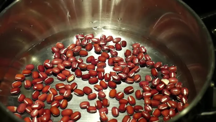 Cook dried red adzuki beans until soft and mash them with a fork. (You can pre-soak them overnight for easier cooking).