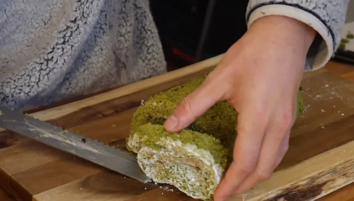Optional: Trim the ends of the cake for a neater appearance.