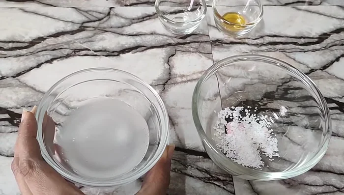Prepare water phase: Combine water, glycerin, and hyaluronic acid.