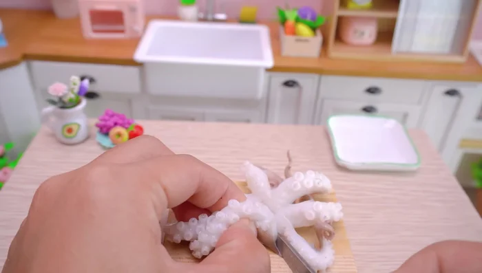 Cut the octopus into small pieces.